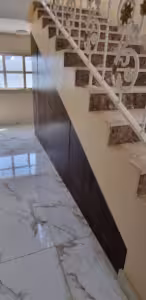 Custom designed Pull out drawers for under the stairs